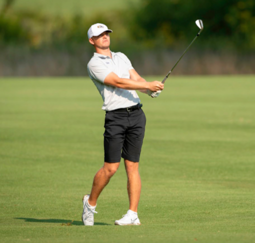Pro Golfer Joe Redford holding a club during a round of golf